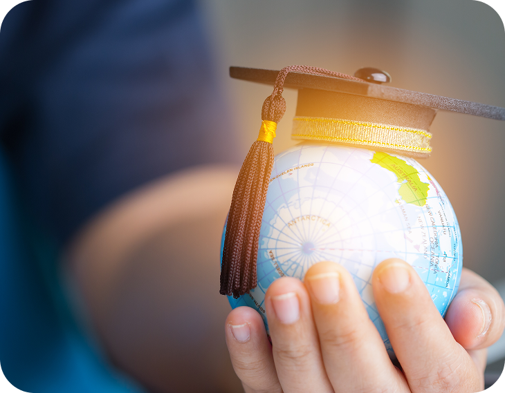 Graduation hat and globe